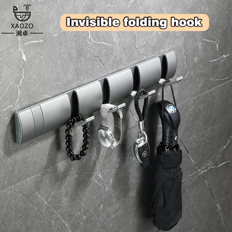 Bathroom  Behind the Door  with Luxurious Clothes Hooks Hanging on the Wall and Hidden Folding