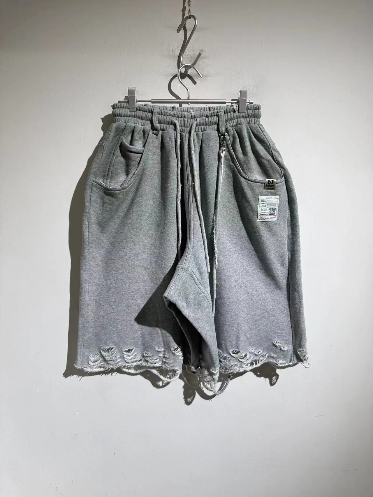 

25ss European and American style unisex Ripped style shorts with Elastic Waist and Loose Fit Ropa Hombre