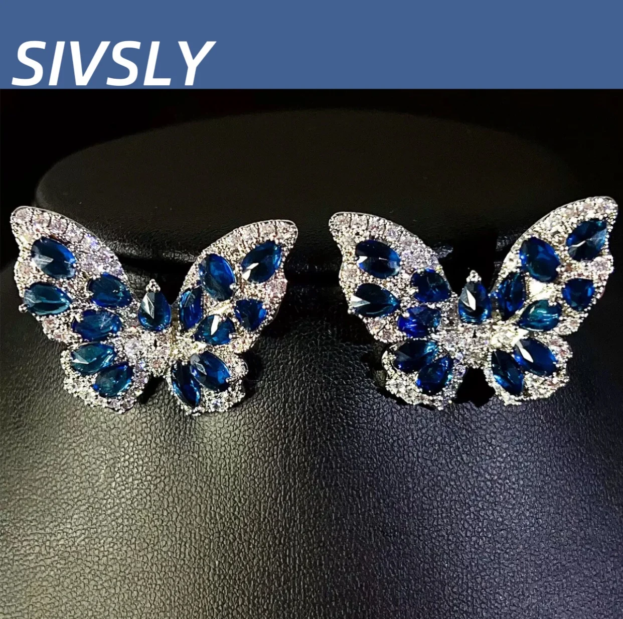 Nuevos pendientes europeos y americanos, trabajo pesado, pendientes de circonita de color de alta gama, pendientes de mariposa de diseño lujoso para mujer