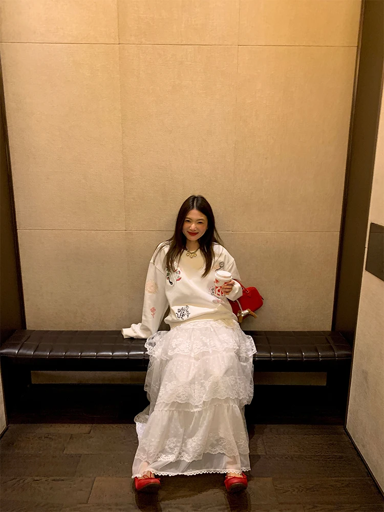 Weißer Spitzen-A-Linien-Kuchenrock für Damen, Design Sensation, Frühling, neuer Stil, vielseitiger Midirock, langer Rock aus Polyestergewebe