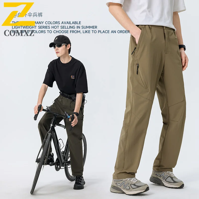 

COMXZ Men Outdoor Softshell Pants Spring Summer Hiking Stretch Workwear Tactical Trekking Casual Elastic Waist Quick Dry Trouser