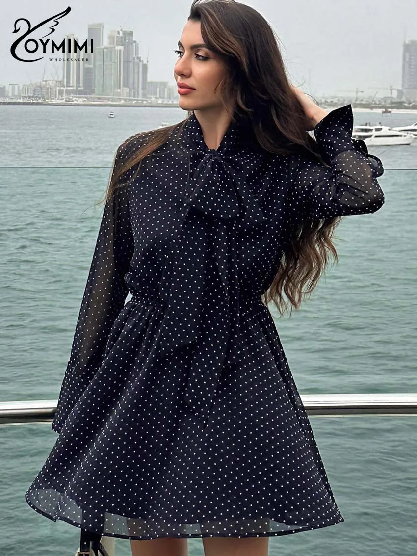 

Oymimi Women's Black Polka Dot Chiffon Dress 2026 Spring Neck Tie Long Sleeve Ruched Waist Flare Mini Dress Vacation Chic Outfit
