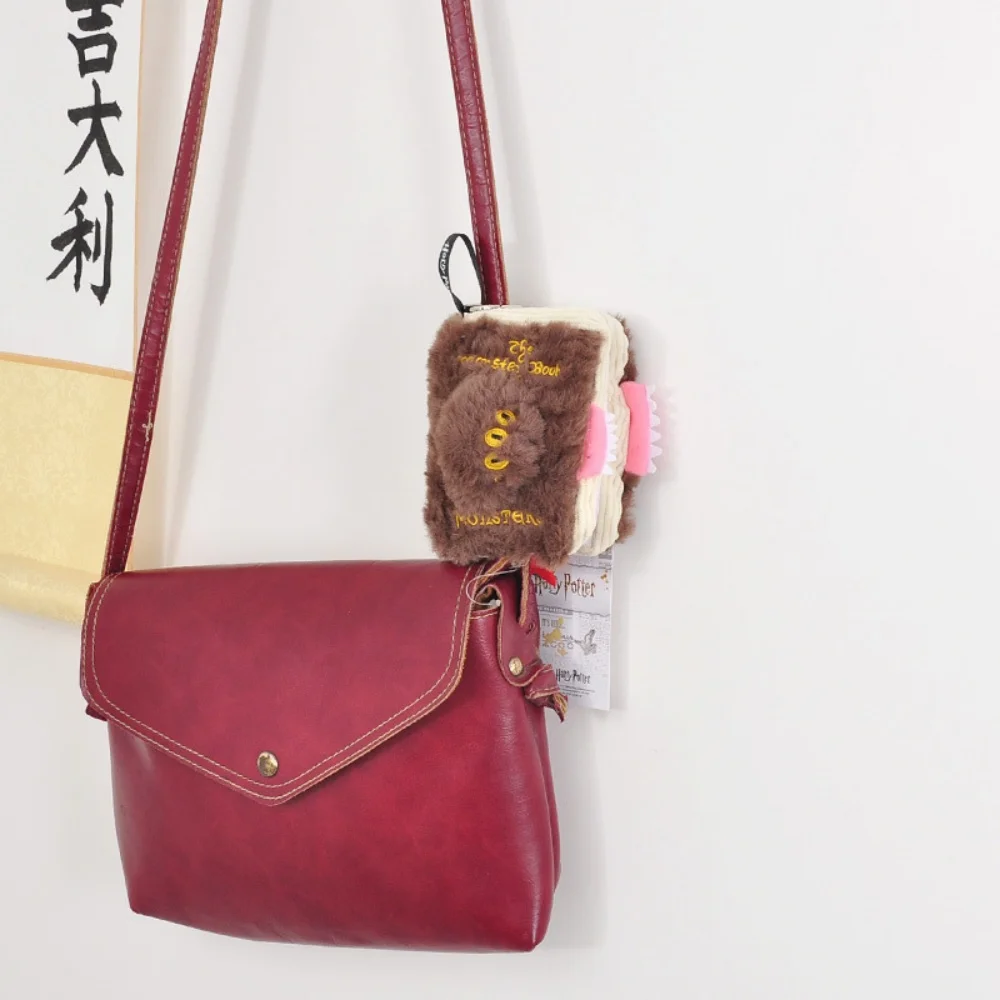 정품 해리포터 몬스터 북 플러시 지갑 귀여운 학생 백팩 장식 액세서리 동전 버스카드 수납 가방