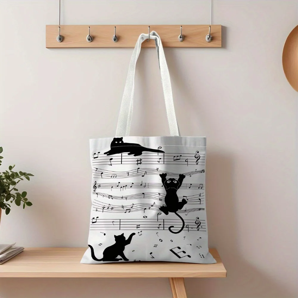 A Cat and Musical Note Theme printed canvas tote bag, suitable for daily use, shopping, school, and travel