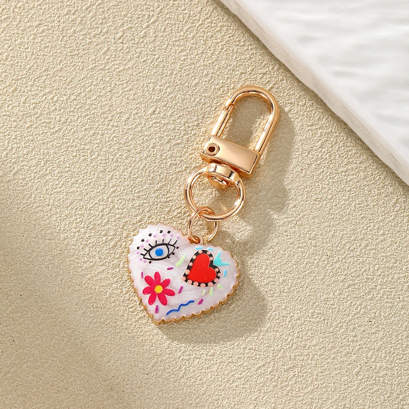 Modischer Schlüsselanhänger mit Emaille-Augen und Herz für Frauen, künstlerischer Stil, Persönlichkeit, kreativer Schlüsselanhänger, Tasche, Kopfhörerhülle, Dekor, Schmuck – Detail 9