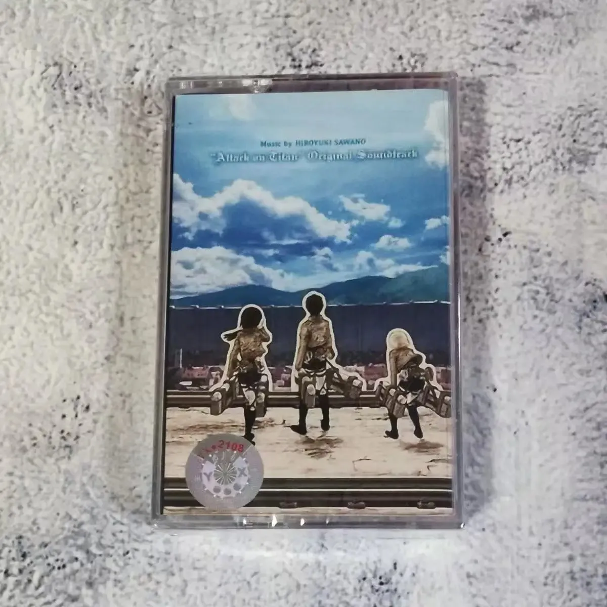 ataque-em-tita-musica-fita-magnetica-maiores-sucessos-album-cassete-cosplay-walkman-gravador-de-carro-armas-sonoras-caixa-festa-musica