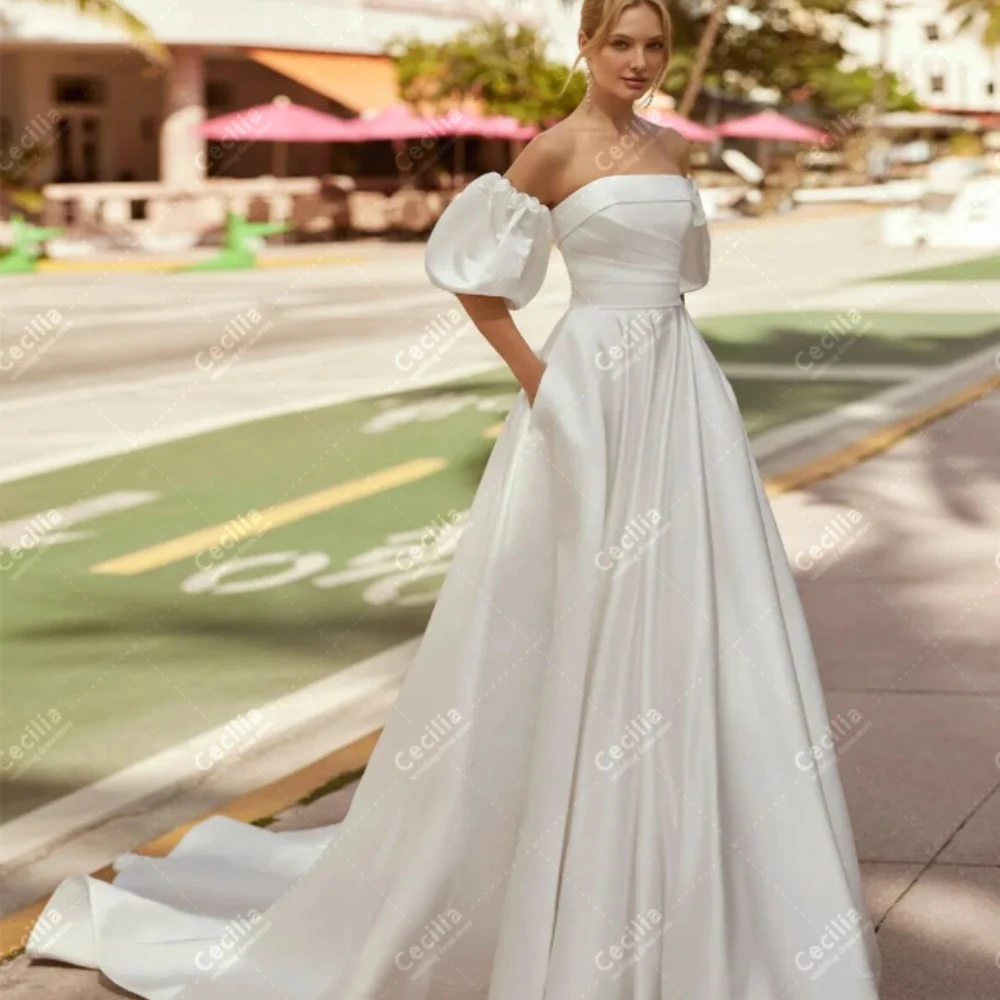 Clássico A-Line cetim vestidos de noiva, simples Strapless Backless Robes, mangas curtas Puff, vestidos de casamento graciosos