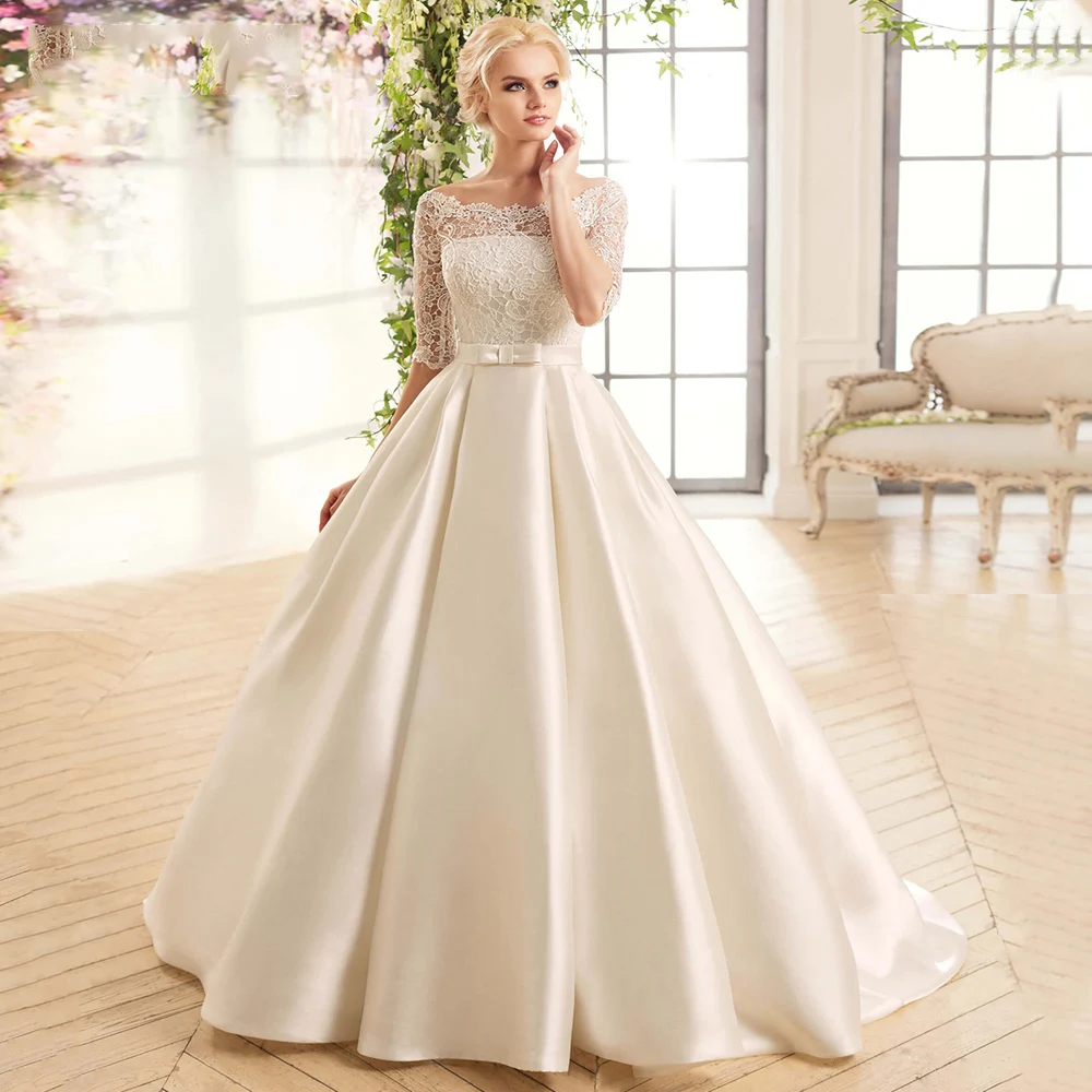 Robe de mariée A-Line Court-Train, robe de mariée en satin, col bateau, manches mi-longues, appliques en dentelle, classique, moderne, éducatif