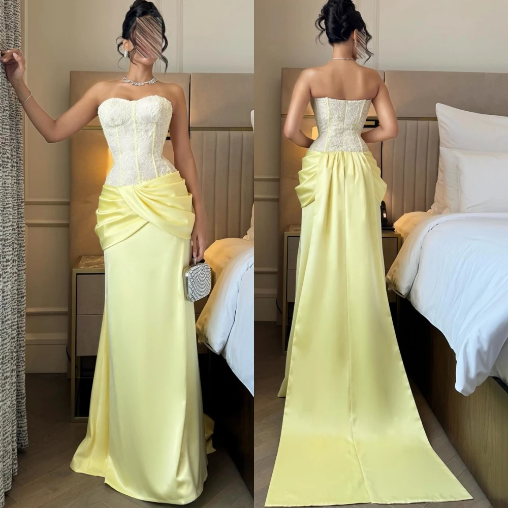 ชุดราตรีสุดหรูแบบสั่งตัดคุณภาพสูง ดีไซน์เกาะอก แขนกุด สง่างาม พร้อมชายกระโปรงยาวแบบคลาสสิก เหมาะสำหรับงานพิเศษ