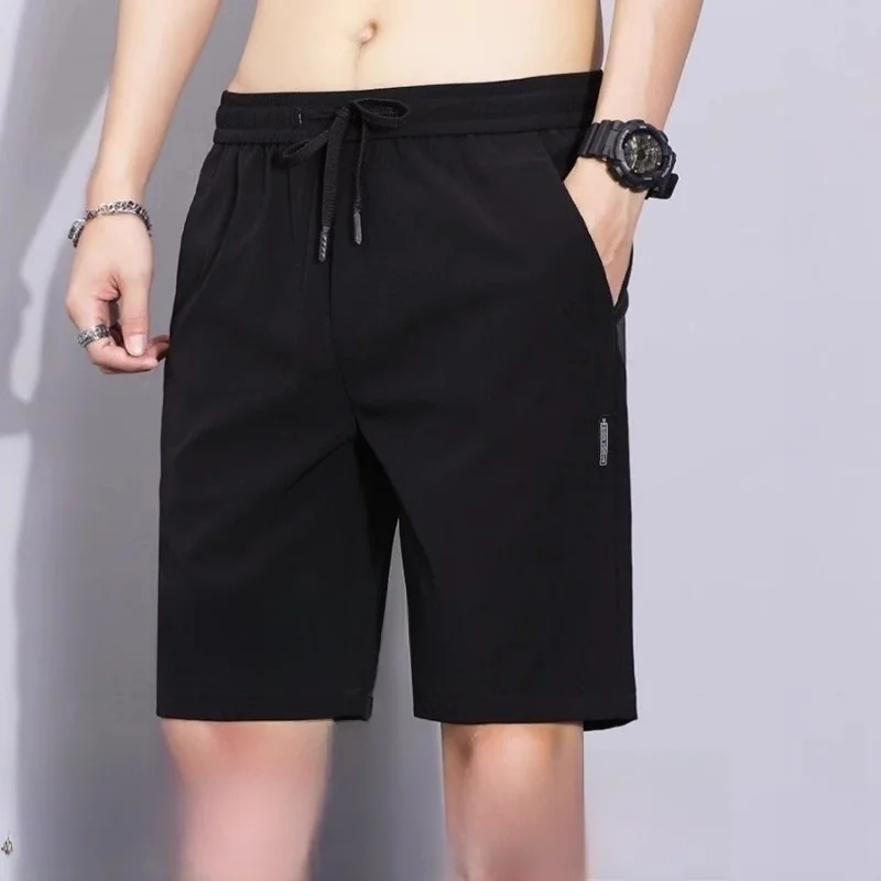 

Men's Summer Ice Silk Sporty Shorts Quick Dry Loose Fit Running Beach Casual Large Size Five-Quarter Mid-Pants