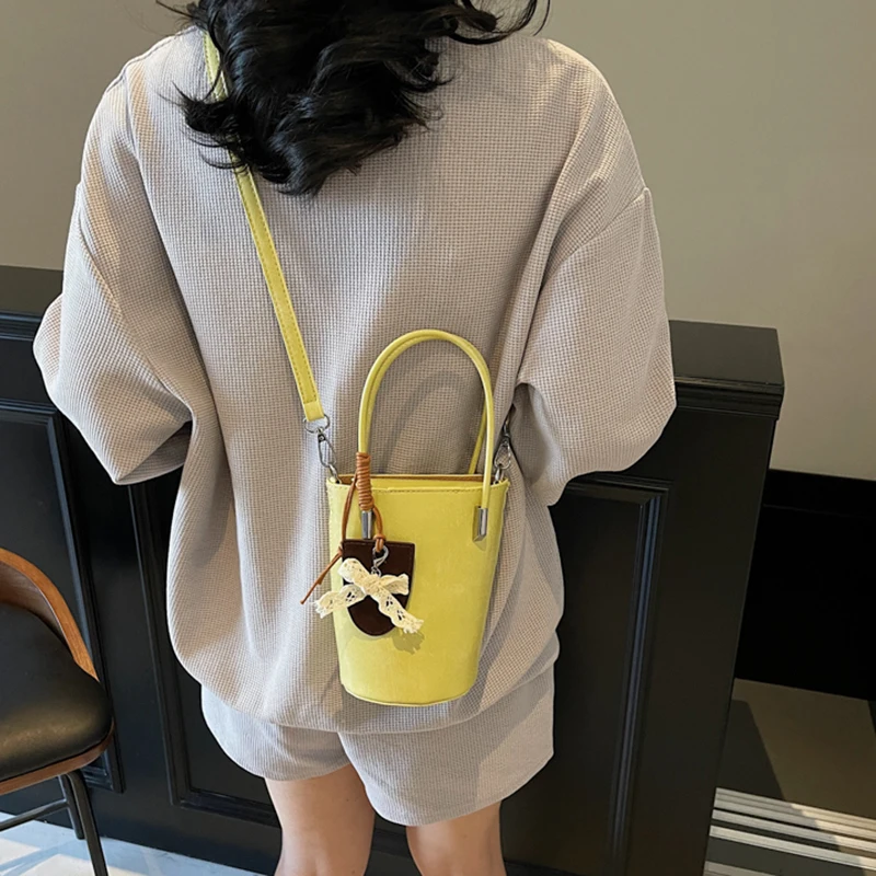 Borse a secchiello portatili in pelle texture da donna con pendente Borsa a tracolla moda estiva Borsa per telefono casual stile coreano