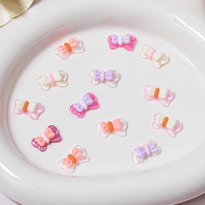 โบว์เรซิ่นผสม10ชิ้น/ถุงการตกแต่งศิลปะเล็บอะคริลิก3D เสน่ห์น่ารักชิ้นส่วนอุปกรณ์ทำเล็บพลอยเทียม DIY โบว์สีสันสดใส