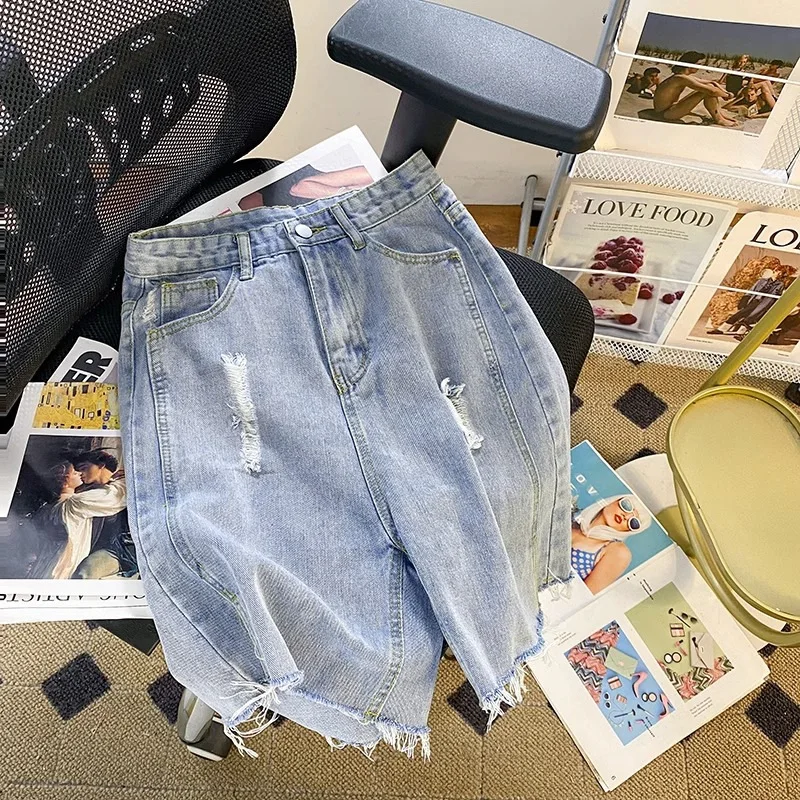 Pantaloni al ginocchio in Denim strappato con foro estate 2024 delle donne nuovi pantaloni da ciclismo con spacco dritto a vita alta coreani pantaloni centrali