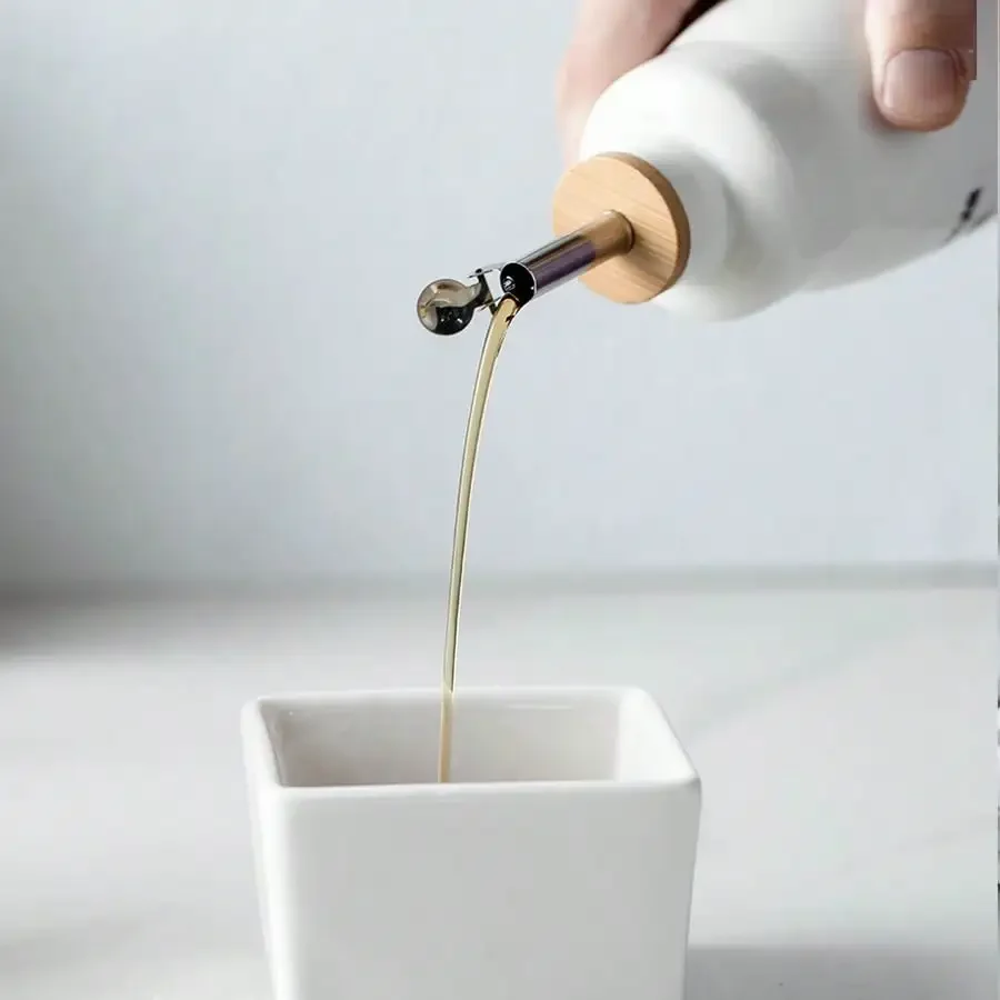 Botella de aceite de cerámica, utensilios de cocina, olla de aceite, salsa de soja, vinagre, tarro de condimentos, decantador comercial creativo de bloqueo de luz