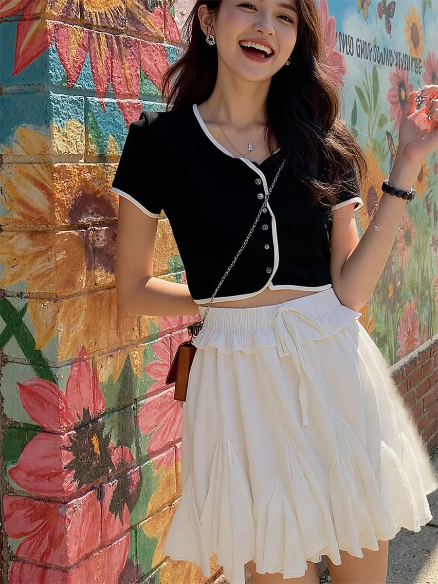 مطوي البسيطة أسود أبيض التنانير النسائية شبكة بالون الطبقات كشكش هيم مرونة الخصر الفني كلية فروي ليلة الباستيل Ins