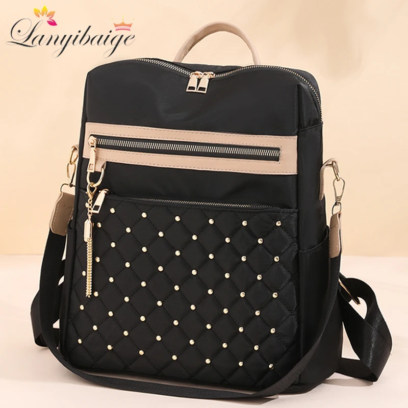 Genuine Brand Ladies Bagpack Luxury Designer Rivet Large Capacity Travel Back Pack Tassels School Bag Casual Lides Shoulder Bags