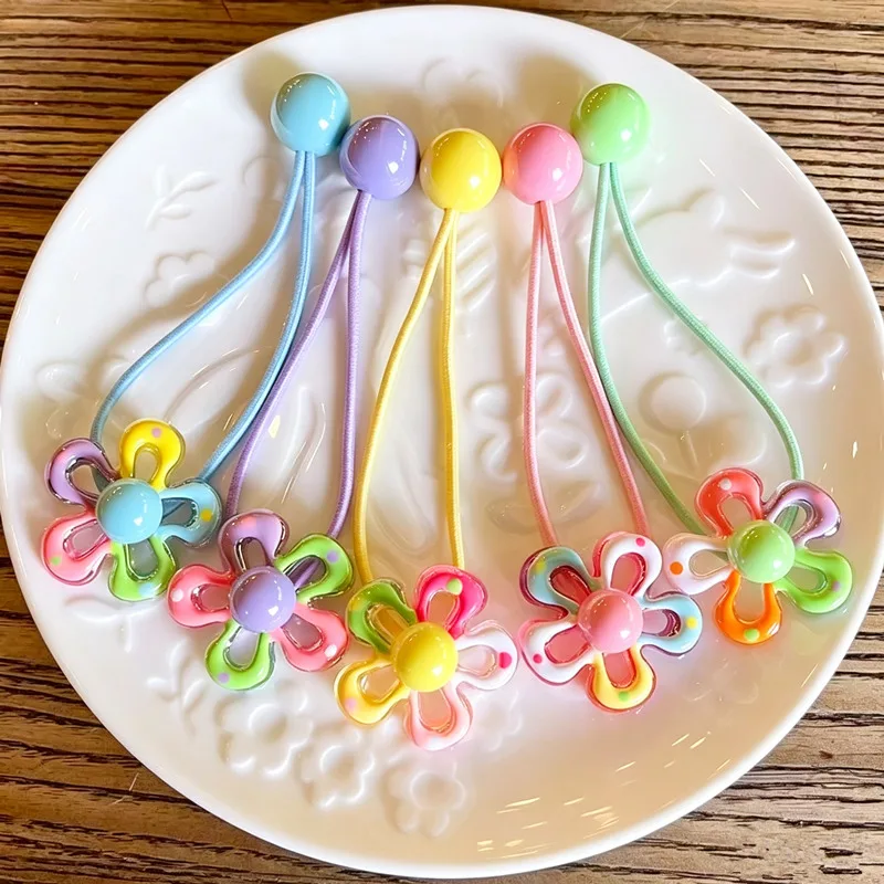 Lot de 5 élastiques à cheveux colorés et mignons en forme de fleur creuse pour petites filles, attaches pour queue de cheval couleur bonbon, accessoires capillaires pour enfants