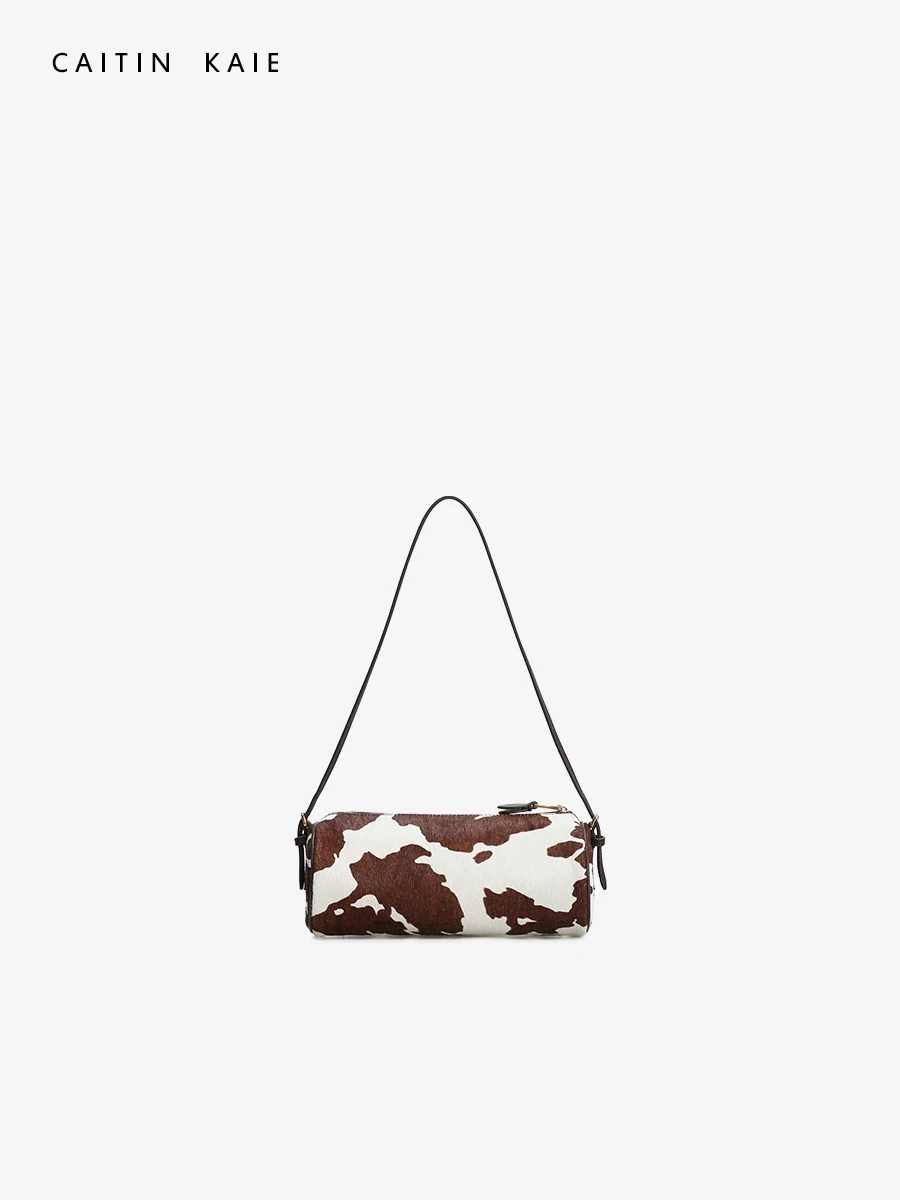 

CaitinKaie Women's round Cylinder oulder Bag Spring Summer 2026 New Lamb Skin Cow Pattern Crossbody Bag American Retro Sle