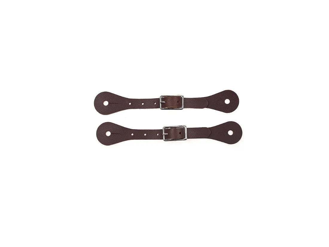 Western-style Spurs (a pair) Bronze Spurs inlaid with German silver decorative plates hand carved with cow heads.