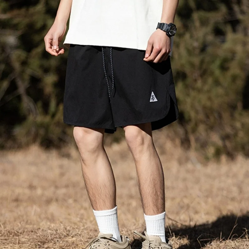 Sports shorts for men, summer split design, beach pants, embroidered casual five quarter pants