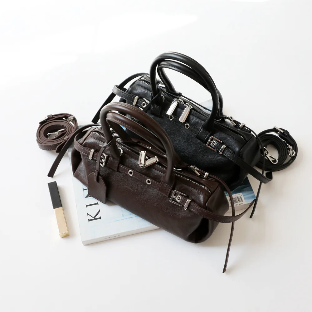 

2026 New High-end Niche Retro Design Vegetable Tanned Cowhide Locomotive Wind Belt Decoration Portable Underarm Bag