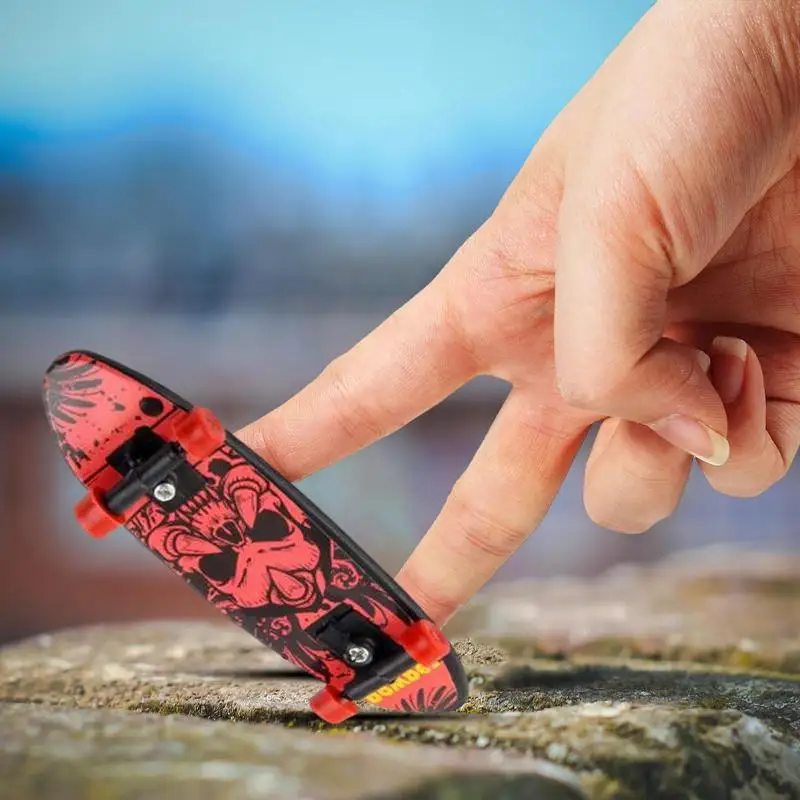 Mini Finger Skateboard piccoli giocattoli leggeri per pattinaggio a dito per bambini giocattoli portatili durevoli per le dita regali per bambini per il compleanno Holida