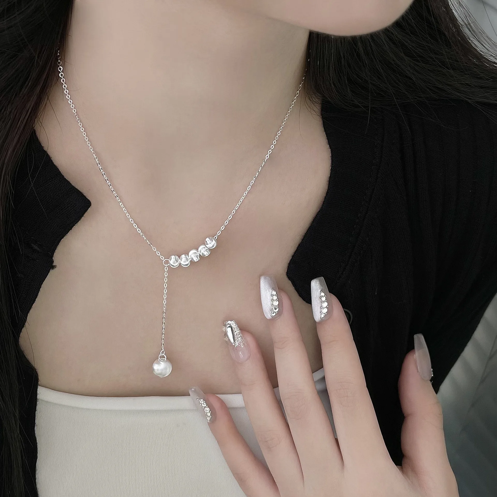 

S925 sterling silver cat eye small round ball flowing light necklace popular spring and summer ins fashion high-end accessory