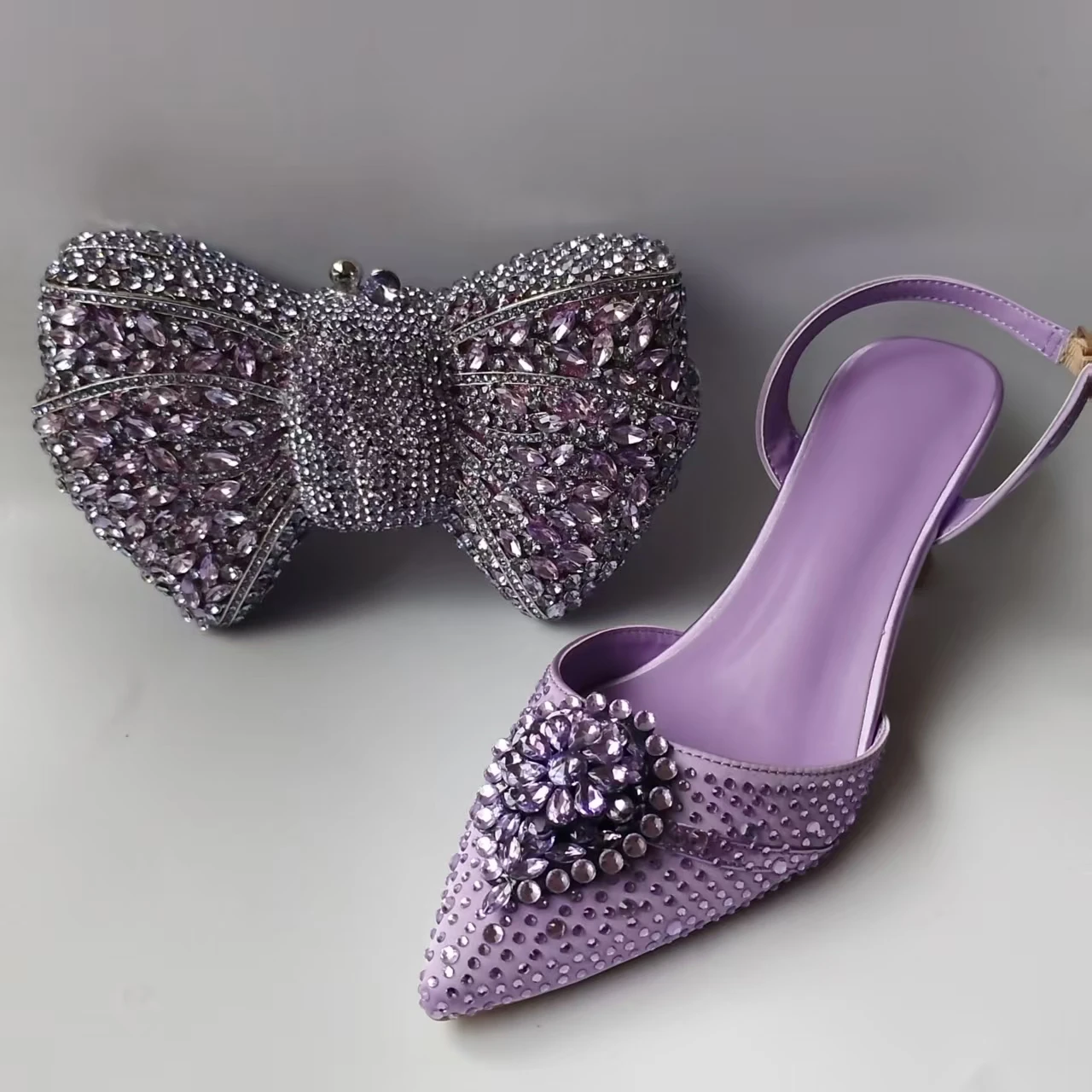 

LNATISNOVA Роскошные фиолетовые туфли-лодочки с острым носком и стразами, в комплекте с вечерней сумкой, женские туфли на каблуке-рюмочке с ремешком на пятке