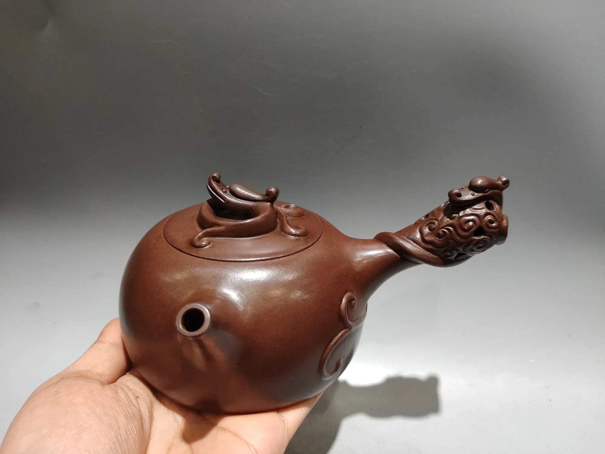 Old Chinese Handicraft Enameled YiXing Zisha (red stoneware) Teapot,A side-handled teapot with an openwork dragon design