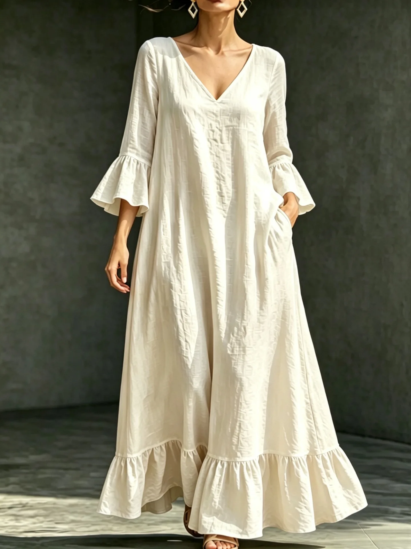 Women’s Spring and Summer New Collection: Seven-Sleeve Dress with Loose V-Neck and Floral Hemline.