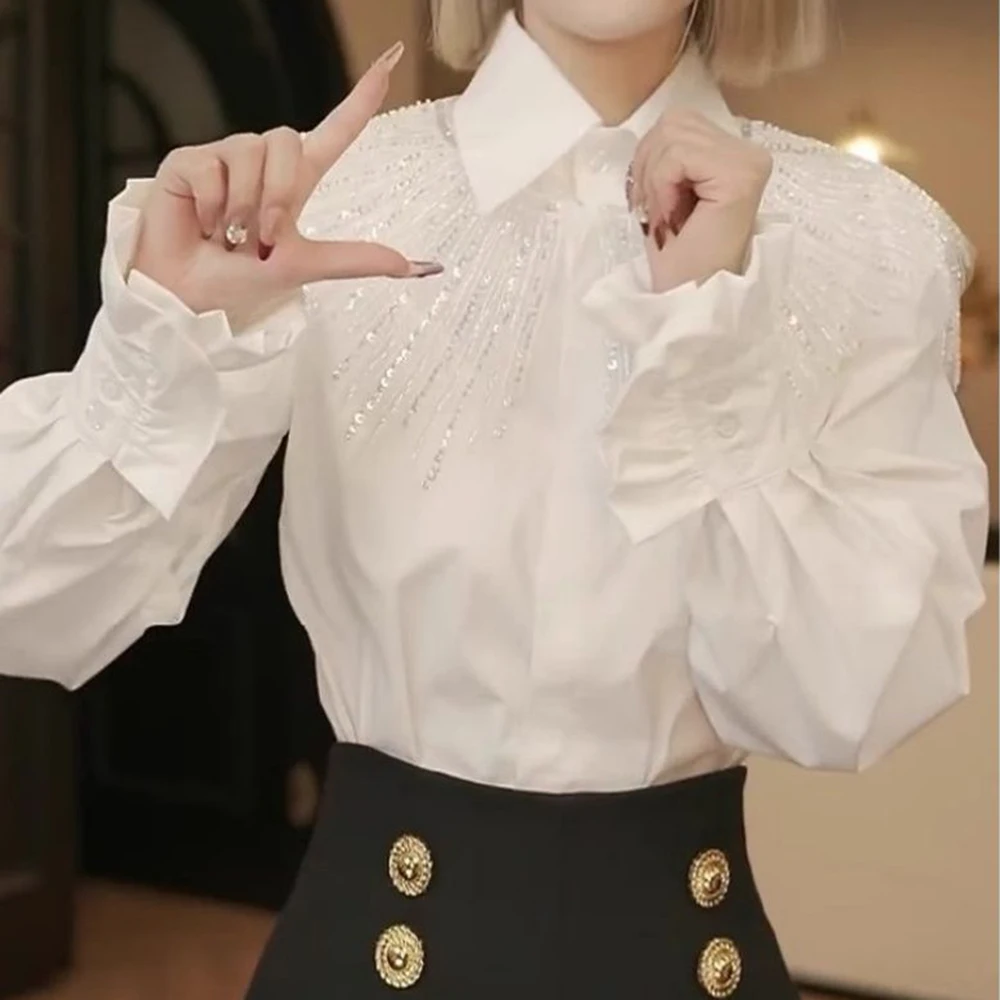 French design sense niche white lapel hot diamond shirt women's 2026 new temperament versatile age-reducing shirt
