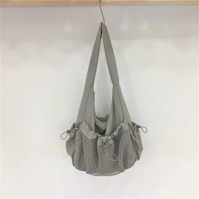 Bolso de lona de nailon con malla hueca para mujer, bolsa de mano informal de marca de moda, bolso de un hombro para las axilas, bolsos de diseñador de lujo, novedad de verano 2024