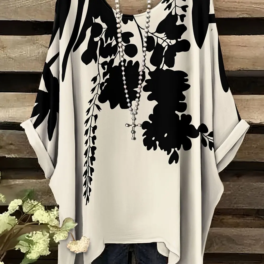 เสื้อทูนิคโบฮีเมียนสำหรับผู้หญิง |   ดีไซน์ลายดอกไม้สีดำและสีขาวหรูหรา รอบคอ ชายกระโปรงพลิ้วไหว เหมาะสำหรับสไตล์ลำลองหรือวันหยุด