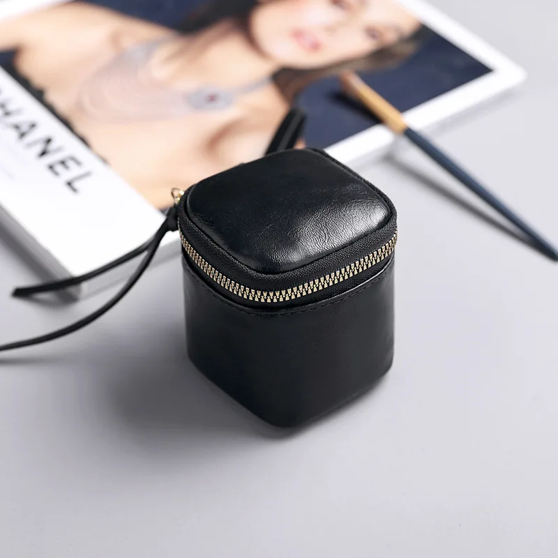 Mini bolso de mano para lápiz labial, novedad de 2025, bolso tipo cubo para auriculares Ins Wind, monedero de almacenamiento de monedas de cuero suave Real