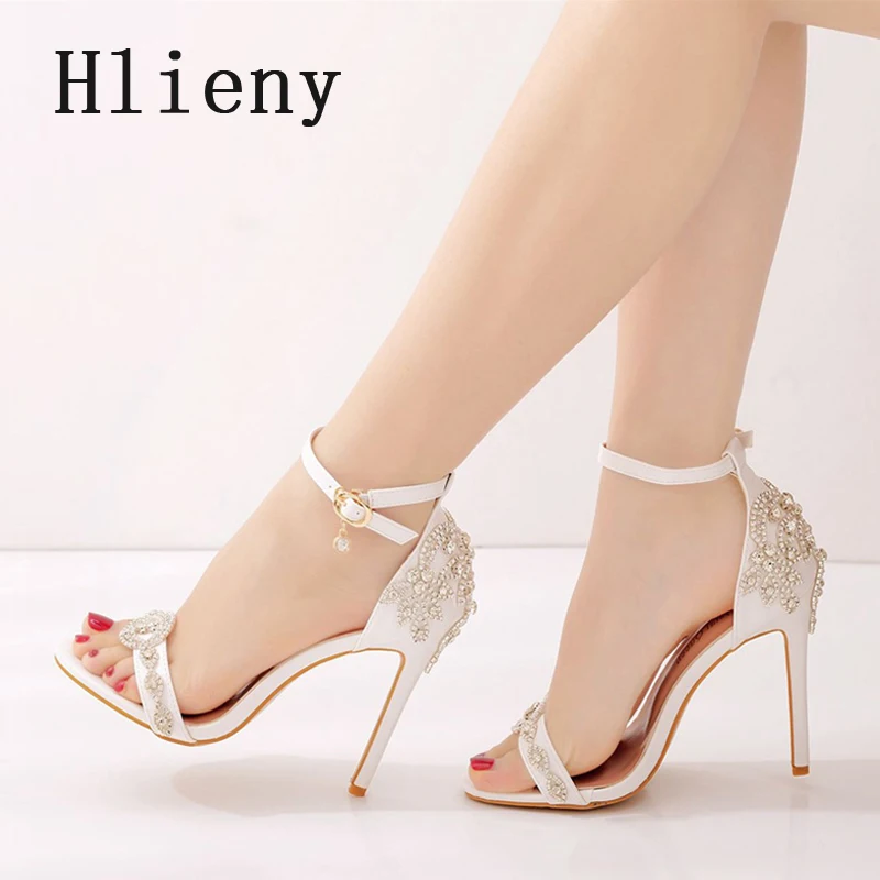 

Hlieny модные женские сандалии с пряжкой и стразами и ремешком для невесты, свадебные туфли на высоком каблуке, летние вечерние туфли-лодочки, женские туфли на шпильке