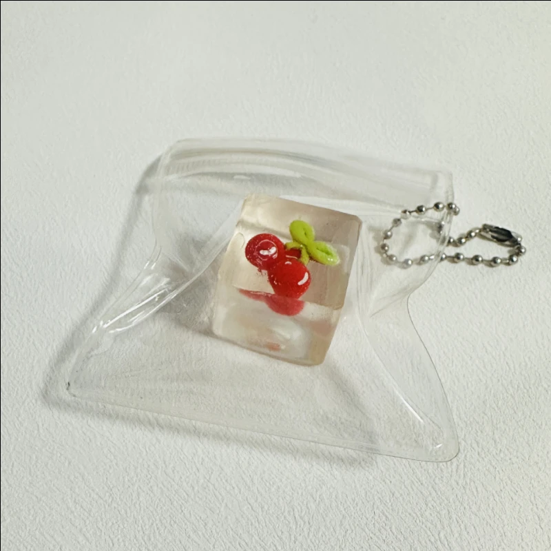 アイスキューブ＆フルーツスクイーズキッズドールキーホルダー - 鼻くそ型ストレス解消おもちゃ、ゆっくり戻る必須アイテム