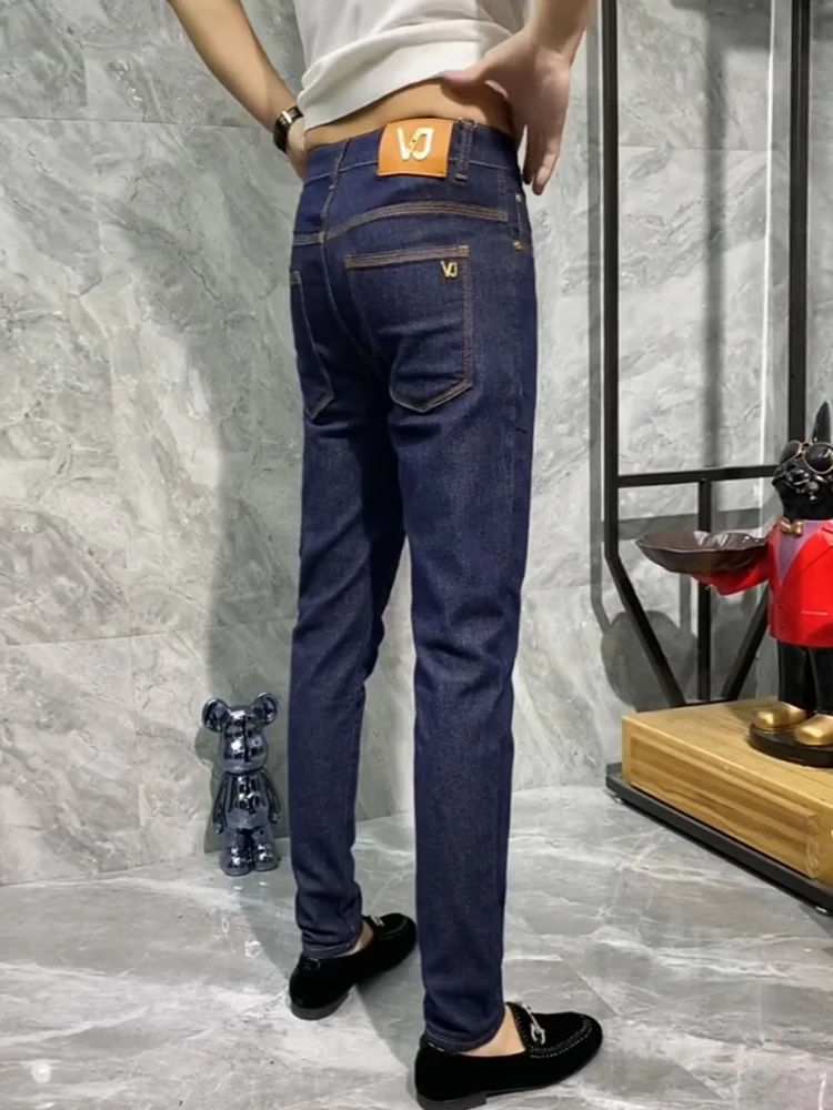 

Washed Blue Jeans Men's Slim Fit Straight Leg Pants Spring 2026 Fashionable Elastic Casual Long Trousers Mid-Rise Waist