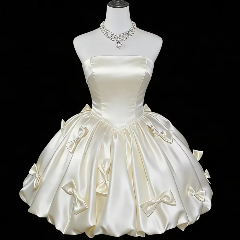 Strapless short ball gown, fitted bodice and fluffy skirt decorated with 3D bows. Custom size available, lovely bridal dress for