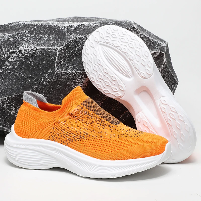 A pair of youth slip-on sock casual shoes, full breathable knit upper, flexible shock-absorbing sole for all-day wear KM-063
