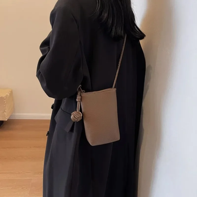 Versatile artistic small fresh small round ball pendant crossbody phone bag, soft leather cute mini bag for women view 3