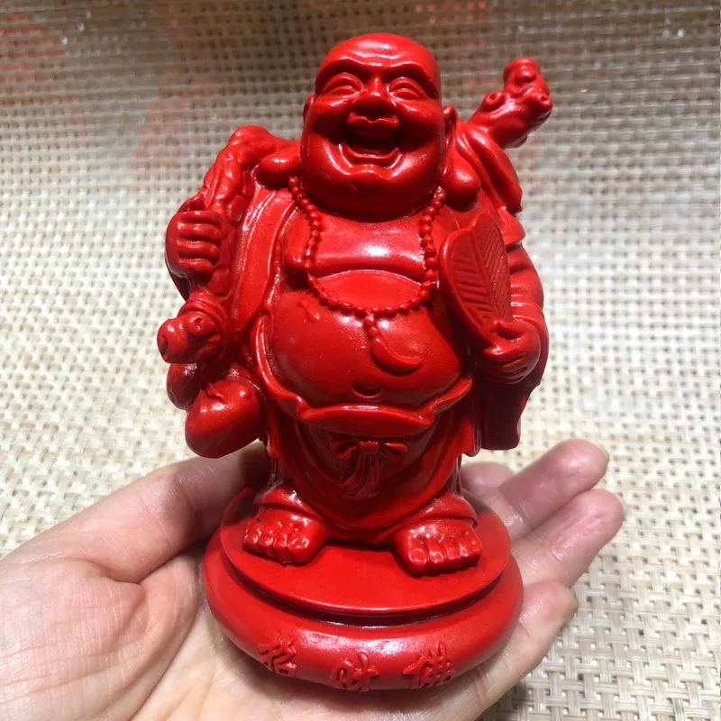 Cinnabar Maitreya Buddha smiles like a purse. The living room is full of feng shui and wealth.  Qian Buddha sent a certificate