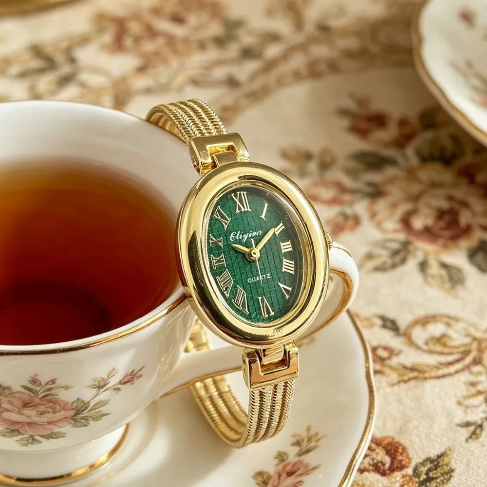 Gold Plated Bracelet Watch Quartz Movement Roman Numerals Ladies Watch Oval Dial Antique Finish Quartz Wristwatch Commuting Wear