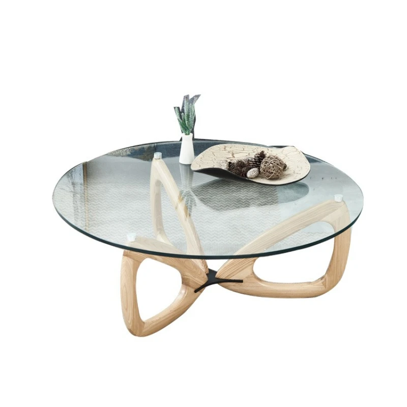

Nordic designer modern simple solid wood light luxury coffee table small apartment tempered glass butterfly round living room