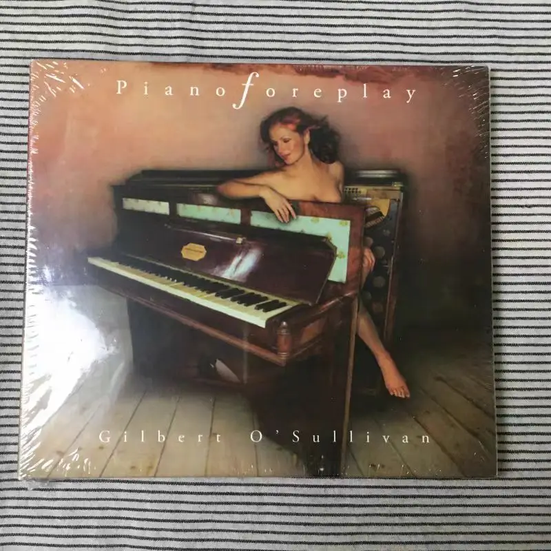 

CD Piano Passion & Witty Wordplay: Шедевр О'Салливана 2003 года: Ирландская остроумность встречается с поп-перфекционизмом: 13 песен