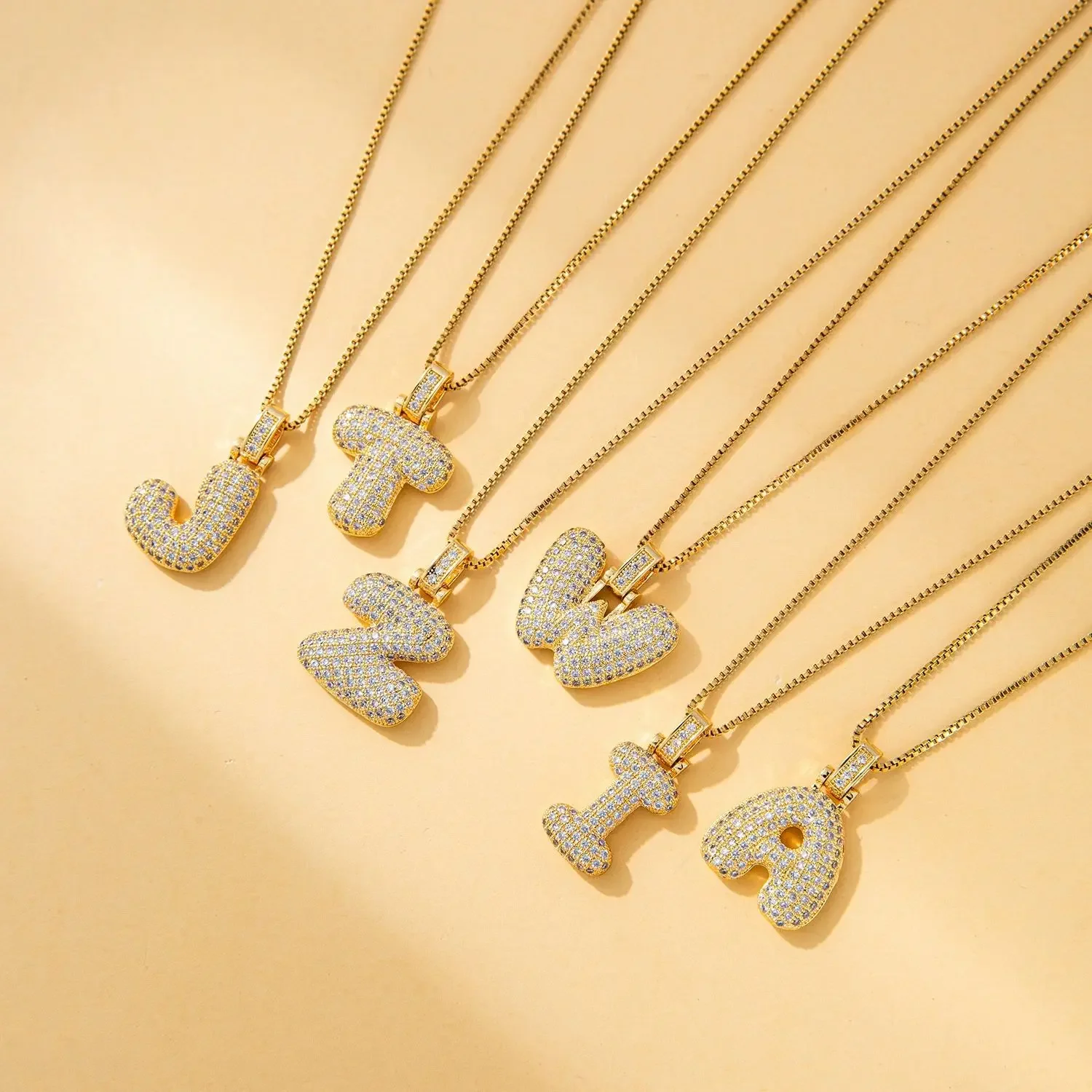 

A feminine European-style zirconia 26-letter titanium steel necklace pendant