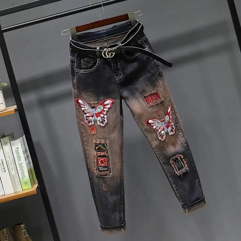 Korean Reviews Many Pants 2025 Spring Autumn Retro Harem Denim Women's Korean Loose Embroidered Butterfly Hiphop Radish Trousers