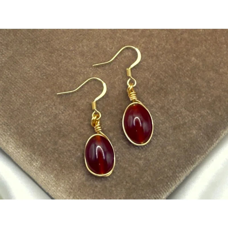 Carnelian crystal gold pendant earrings: July birthstone jewelry