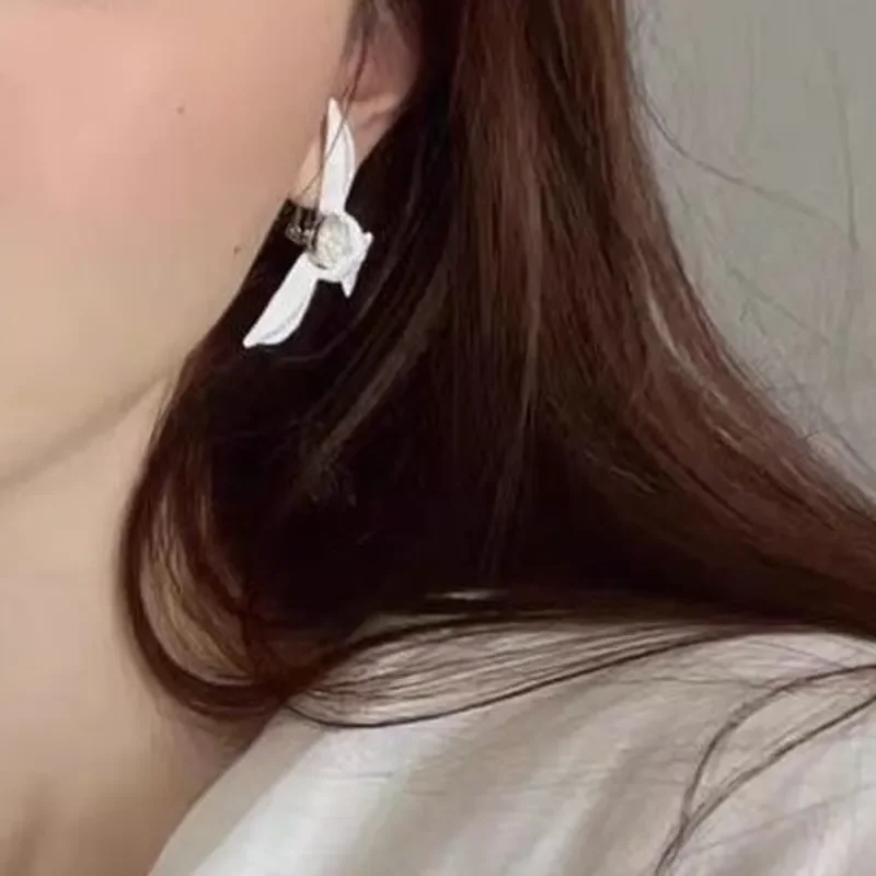 25 spring and summer new niche orchid enamel earrings fresh and sweet versatile stud earrings women's high-end elegant ear
