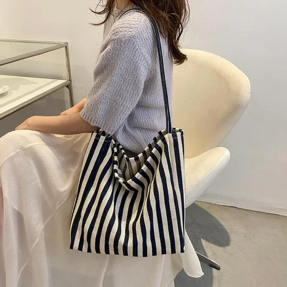 

Female Casual Multifunctional Travel Top-handle Handbag Large Capacity Canvas Women Shopper Tote Simple Striped Shoulder Bag2025
