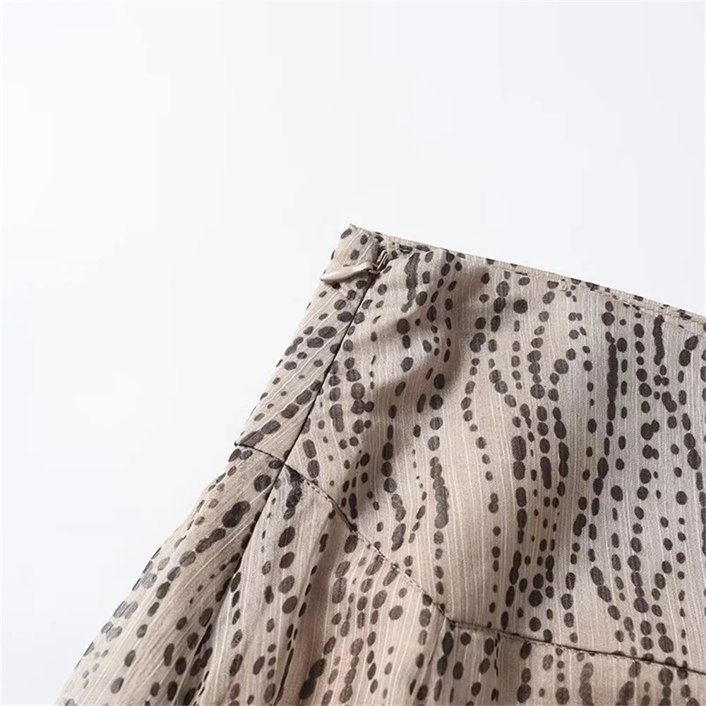 Herbst und Winter neue Damenbekleidung Französische Kunstserie Polka Dot Print Design Sinn unregelmäßiger Rock Rock